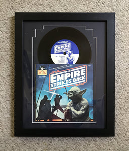 “Empire strikes back” 1979 framed record and book