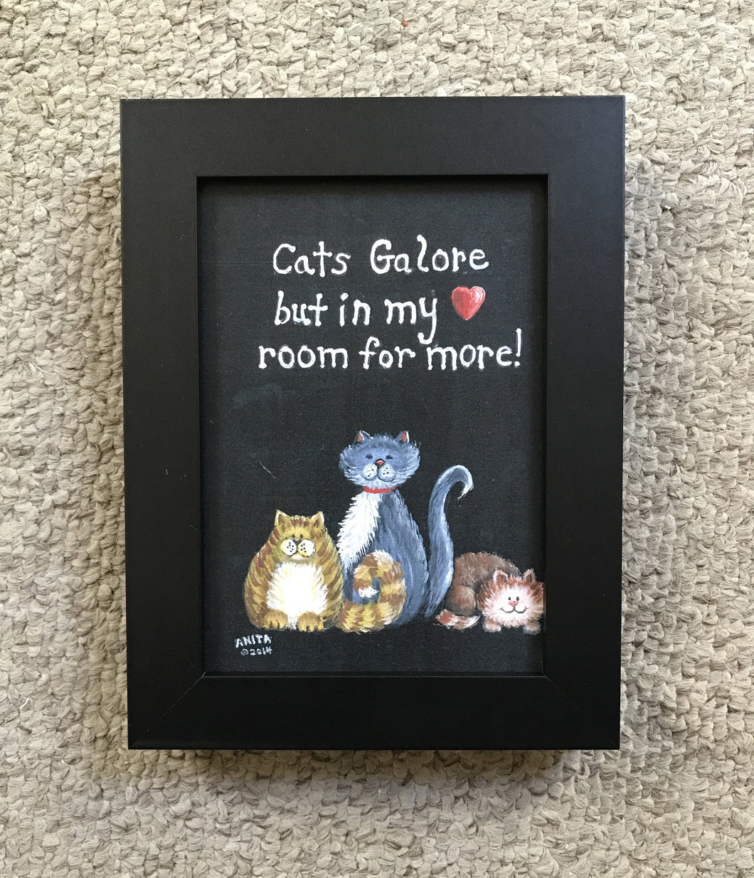 “Cats galore, but in my heart, room for more”